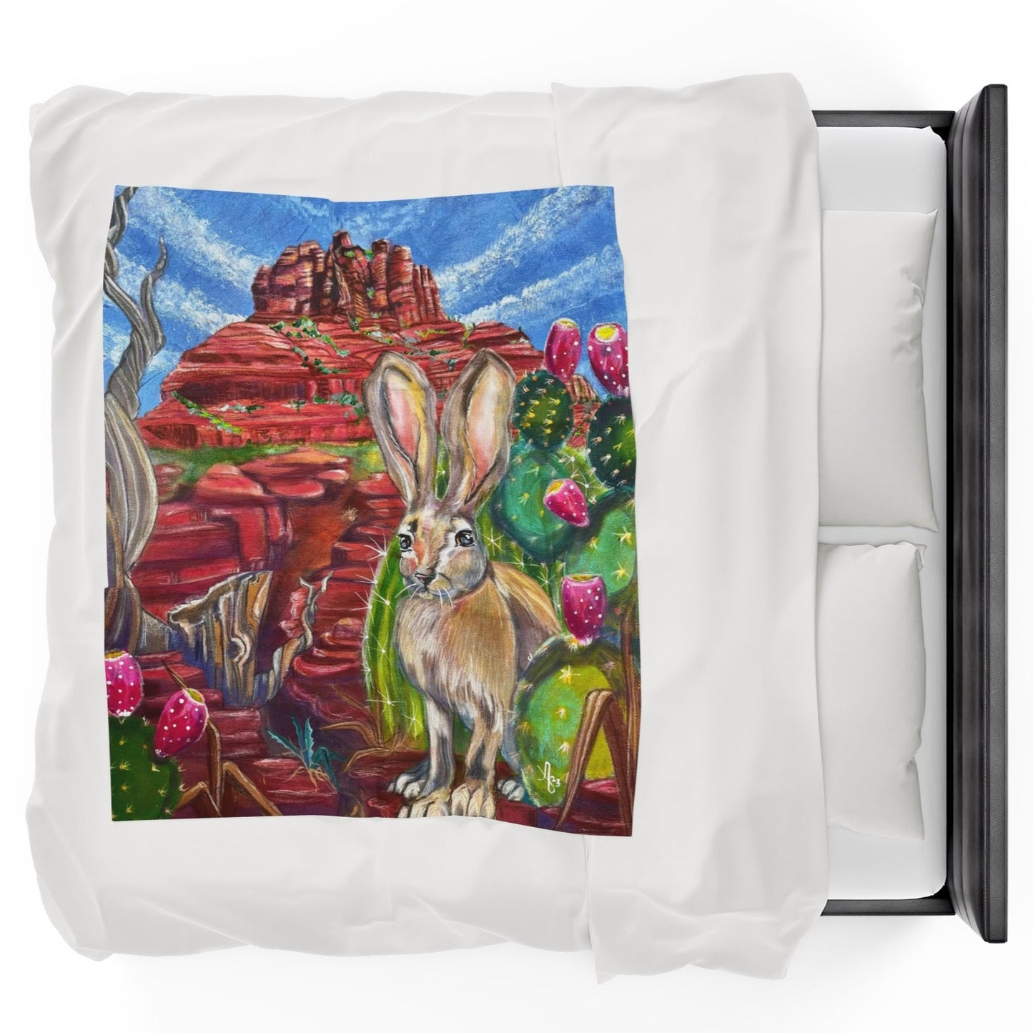 50x60 Blanket - Hare at Bell Rock Velveteen Plush Throw - from Mama Mosaic Artworks - Southwestern Art. This dynamic velveteen plush throw blanket is printed edge to edge in high detail using vibrant colors. It is reproduced from the original canvas painting, Hare at Bell Rock, by Mama Mosaic Artworks, and brings an instant aesthetic to any room. For those who believe in vortex points, or who love Sedona, Arizona, desert decor, a Mexican or southwestern aesthetic, or simply love this charming work of art.